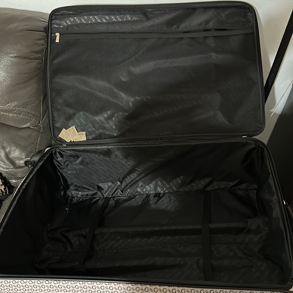 Guess soft material large suitcase used twice only don’t need anymore. - Picture 3 of 3
